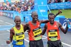 Wilson Kipsang (centre) winner Micah Kogo (left) 2nd and 3rd Imane Merga the 2012 BUPA GNR. 